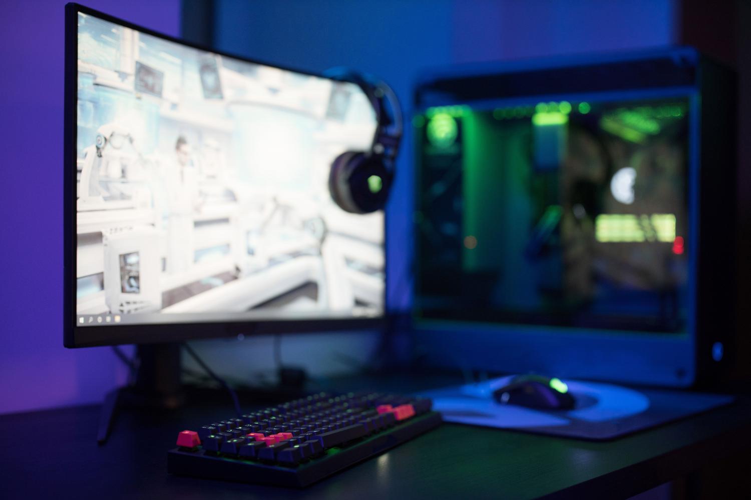 Estación de juego de alta tecnologÃa con monitor curvo, ilustrando la fluidez visual que aporta la generación de fotogramas. Estación de juego de alta tecnologÃa con monitor curvo, ilustrando la fluidez visual que aporta la generación de fotogramas.